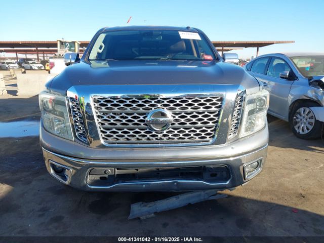 1N6AA1E65HN528567 Nissan Titan Sl