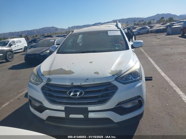 5NMZU3LB5JH063543 Hyundai Santa Fe Sport 2.4l