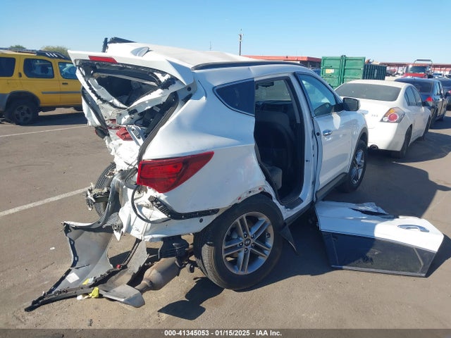 5NMZU3LB5JH063543 Hyundai Santa Fe Sport 2.4l