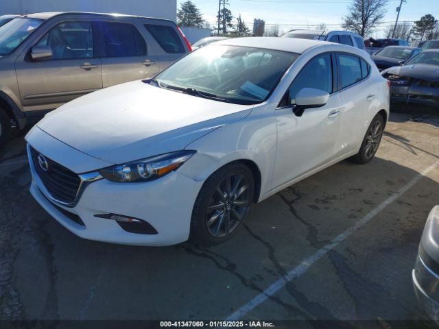 3MZBN1L31JM185077 Mazda Mazda3 Touring