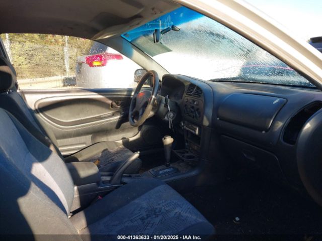 2001 MITSUBISHI MIRAGE JA3AY11A91U038362 Photo 4