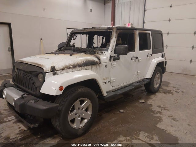 1C4BJWEG4EL164016 Jeep Wrangler Unlimited Sahara