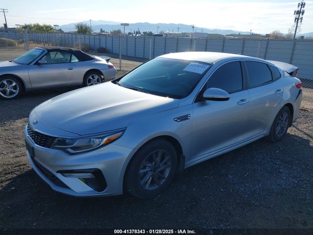 5XXGT4L35LG400335 KIA Optima Lx