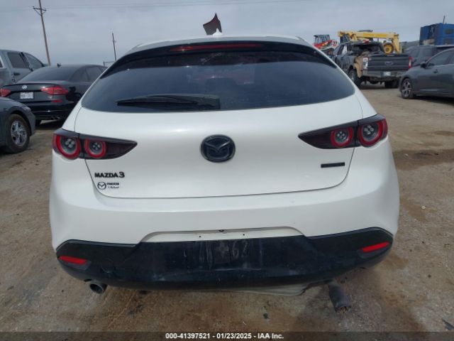JM1BPAML0M1302385 Mazda Mazda3 Premium