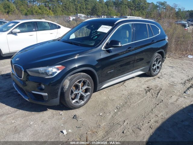 2017 BMW X1 WBXHT3C34H5F70525 Photo 1