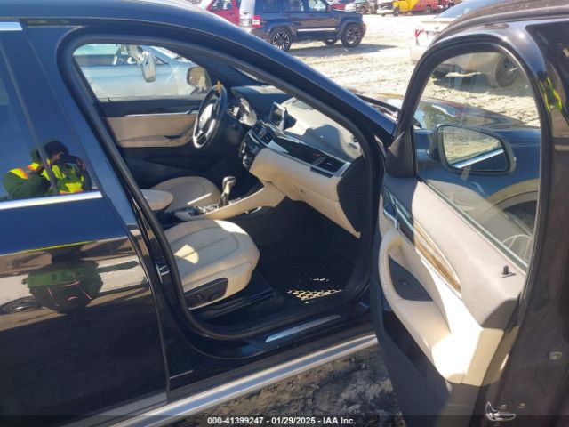 2017 BMW X1 WBXHT3C34H5F70525 Photo 4