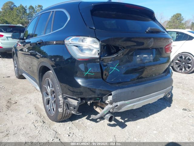2017 BMW X1 WBXHT3C34H5F70525 Photo 5