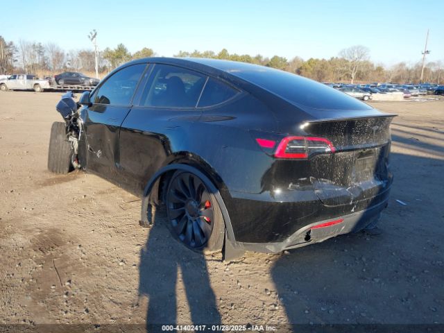 2024 TESLA MODEL Y 7SAYGDEFXRA282830 Photo 2