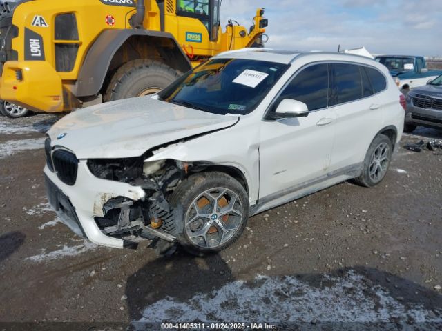 2018 BMW X1 WBXHT3C32J5K31684 Photo 1