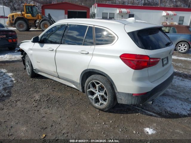 2018 BMW X1 WBXHT3C32J5K31684 Photo 2