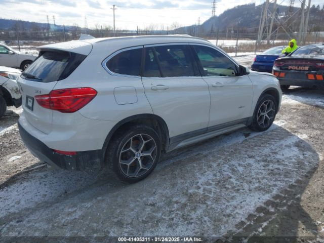 2018 BMW X1 WBXHT3C32J5K31684 Photo 3