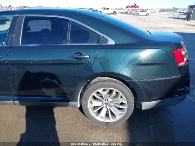1FAHP2F83EG104915 Ford Taurus Limited