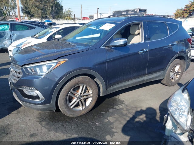 5NMZU3LB4HH042130 Hyundai Santa Fe Sport 2.4l