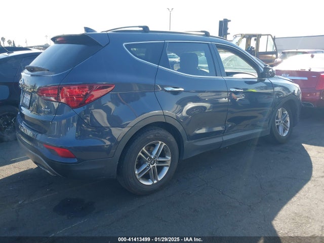 5NMZU3LB4HH042130 Hyundai Santa Fe Sport 2.4l