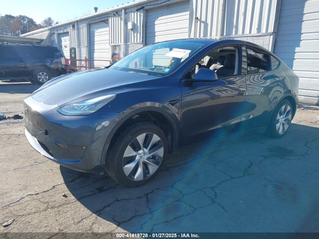 2021 TESLA MODEL Y 5YJYGAEE6MF180410 Photo 1
