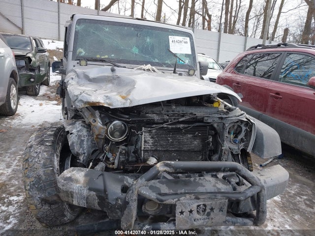 1C4HJWDG1EL302087 Jeep Wrangler Unlimited Sport
