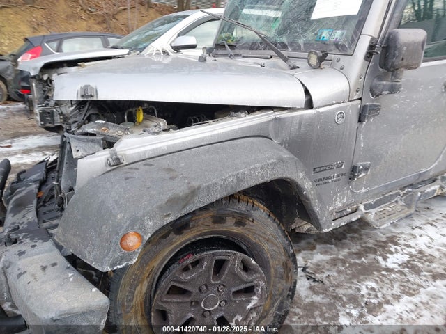 1C4HJWDG1EL302087 Jeep Wrangler Unlimited Sport