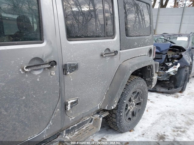 1C4HJWDG1EL302087 Jeep Wrangler Unlimited Sport
