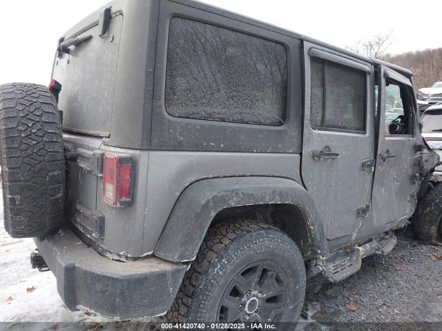 1C4HJWDG1EL302087 Jeep Wrangler Unlimited Sport