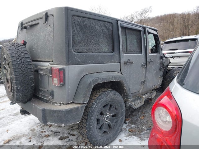 1C4HJWDG1EL302087 Jeep Wrangler Unlimited Sport