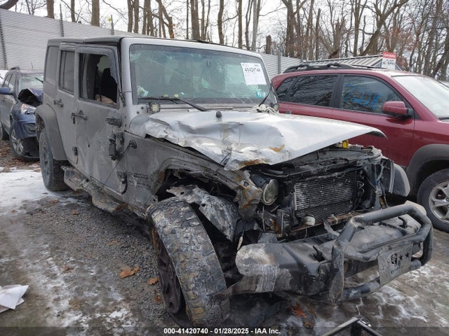 1C4HJWDG1EL302087 Jeep Wrangler Unlimited Sport