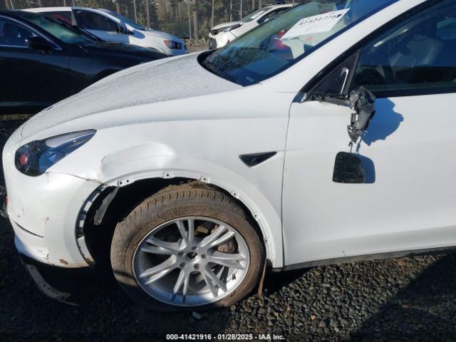 7SAYGDEE8RF063844 Tesla Model Y Long Range Dual Motor All-wheel Drive