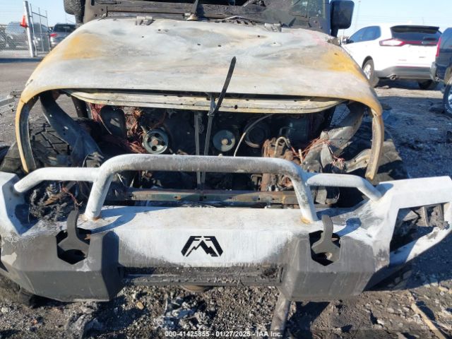 1C4HJWDG0EL299053 Jeep Wrangler Unlimited Sport