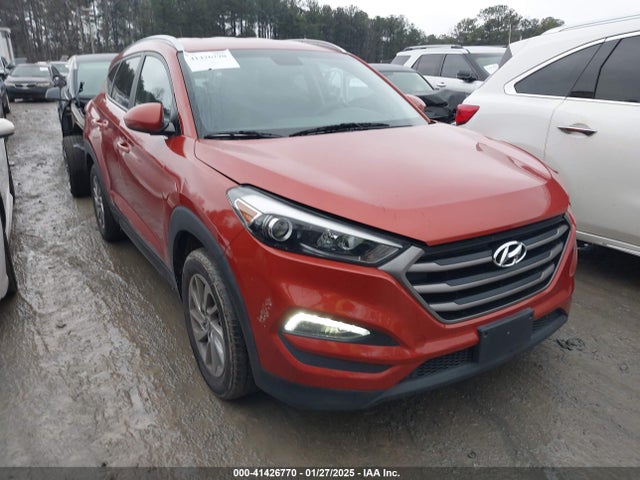 KM8J33A40GU141521 Hyundai TUCSON SE
