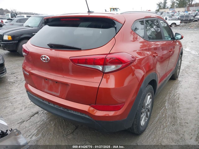 KM8J33A40GU141521 Hyundai TUCSON SE