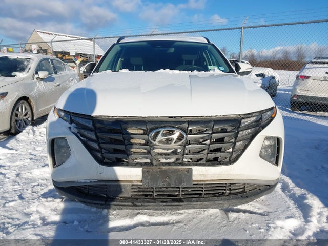 KM8JBCA19NU021092 Hyundai Tucson Hybrid Blue