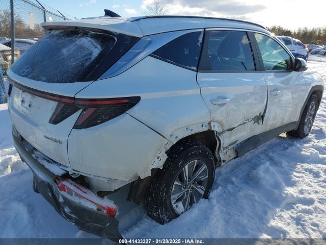 KM8JBCA19NU021092 Hyundai Tucson Hybrid Blue