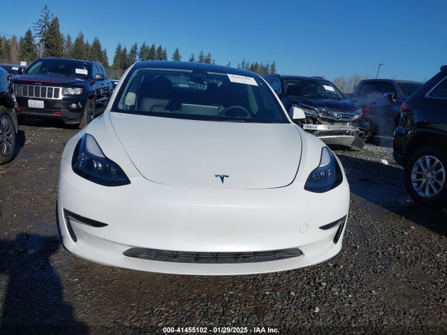 5YJ3E1EA0PF611244 Tesla 2023