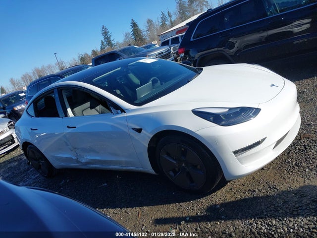 5YJ3E1EA0PF611244 Tesla 2023