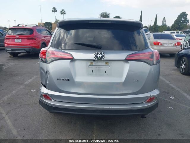 JTMZFREV9JJ174952 Toyota RAV4 LE