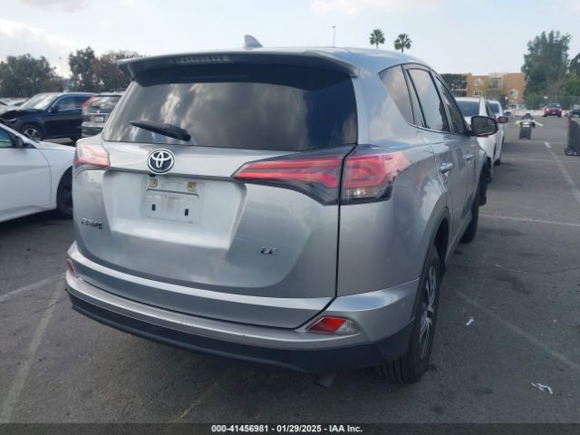JTMZFREV9JJ174952 Toyota RAV4 LE