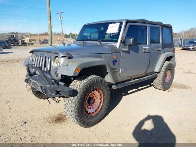 1C4HJWDG9GL177343 Jeep Wrangler Unlimited Sport