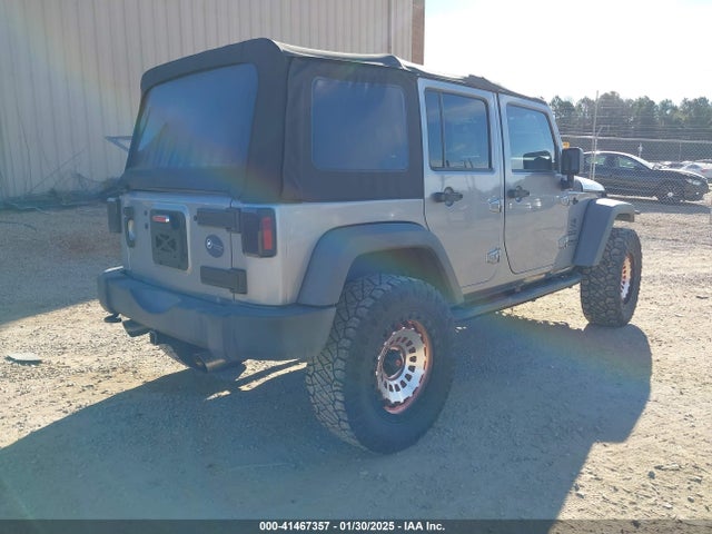 1C4HJWDG9GL177343 Jeep Wrangler Unlimited Sport