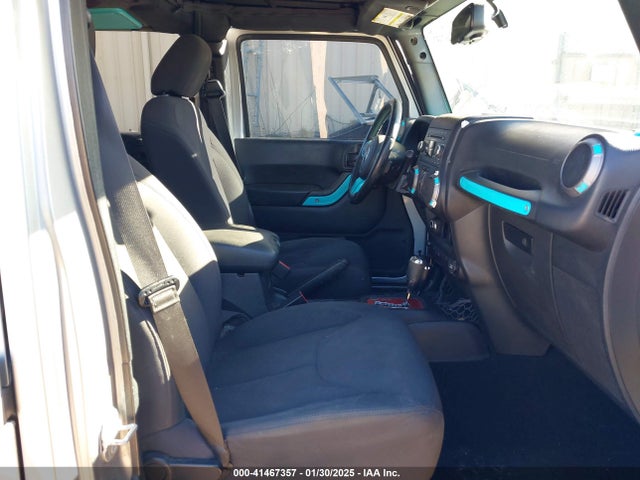 1C4HJWDG9GL177343 Jeep Wrangler Unlimited Sport