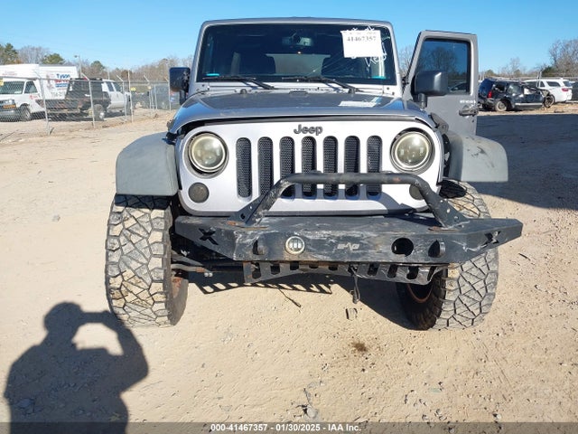 1C4HJWDG9GL177343 Jeep Wrangler Unlimited Sport
