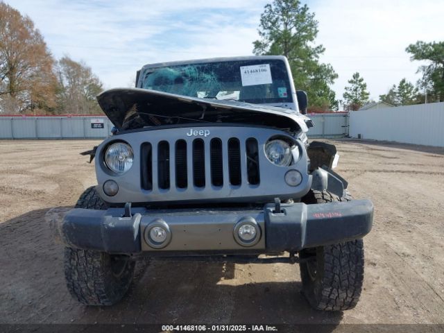 1C4BJWDG0FL586710 Jeep Wrangler Unlimited Freedom Edition