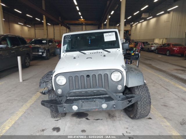 1C4BJWDGXEL305267 Jeep Wrangler Unlimited Sport