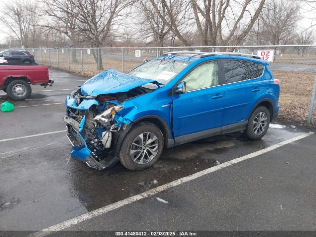 2016 TOYOTA RAV4 HYBRID JTMRJREV6GD028806 Photo 1