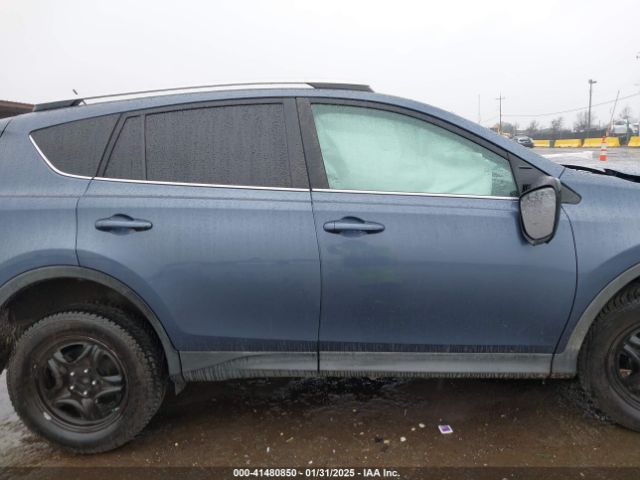 2T3ZFREV7EW115972 Toyota RAV4 LE