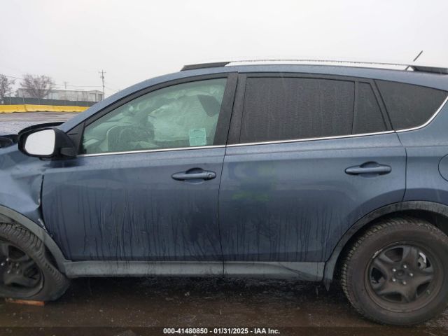 2T3ZFREV7EW115972 Toyota RAV4 LE