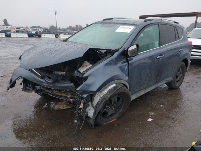 2T3ZFREV7EW115972 Toyota RAV4 LE