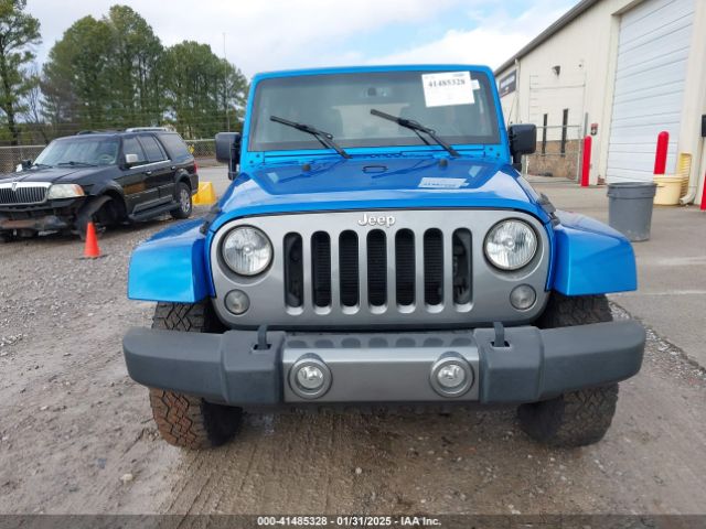 1C4BJWDG8FL581819 Jeep Wrangler Unlimited Freedom Edition