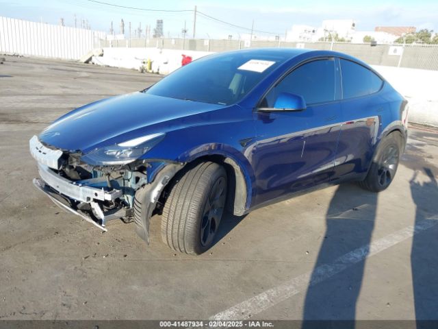 2024 TESLA MODEL Y 7SAYGDEE2RA242815 Photo 1