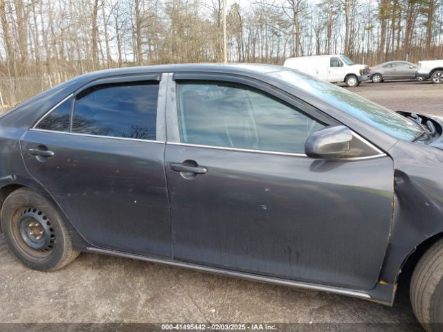 4T1BD1FK3EU099114 Toyota Camry Hybrid Le