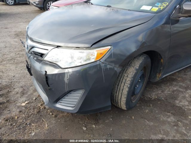 4T1BD1FK3EU099114 Toyota Camry Hybrid Le