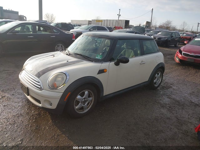 2009 MINI COOPER WMWMF335X9TW73606 Photo 1